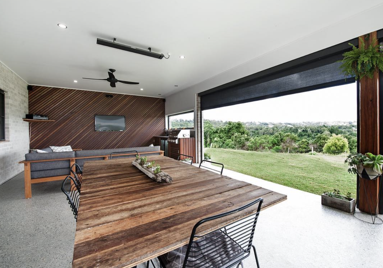 Covered alfresco entertaining area with timber feature wall and hinterland views, painted by R J Britt Painting, painters on the Gold Coast