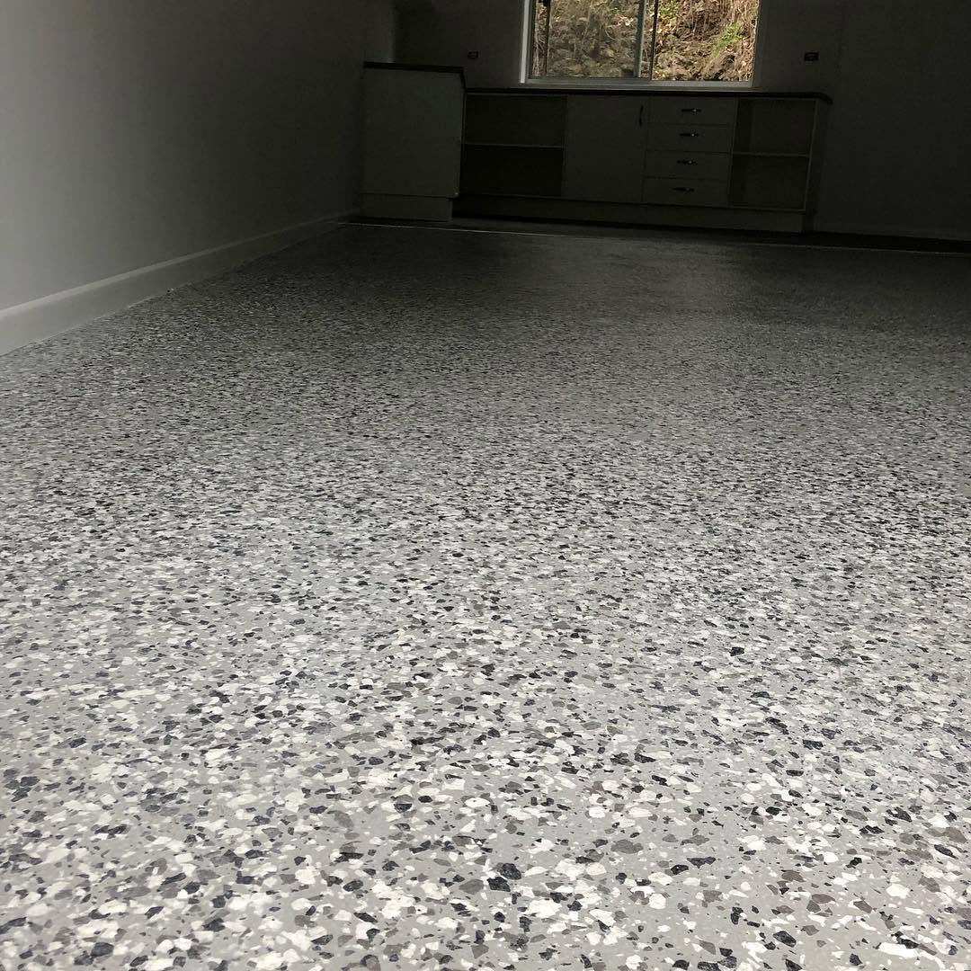 Commercial garage floor finished with flake two-pac epoxy coating by R J Britt Painting in Lismore, NSW