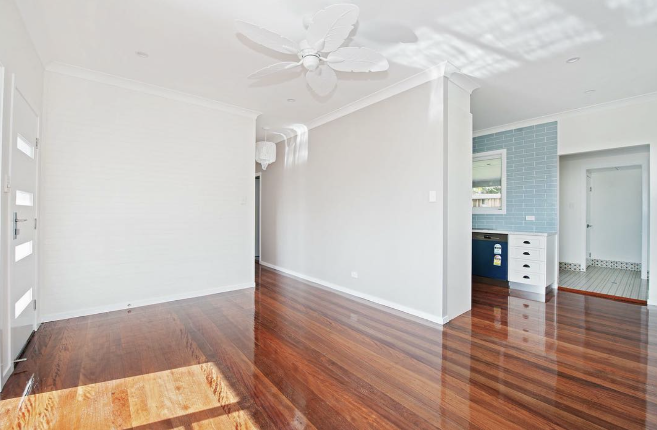 Freshly painted white interior with polished timber floors in a Northern Rivers home painted by R J Britt Painting